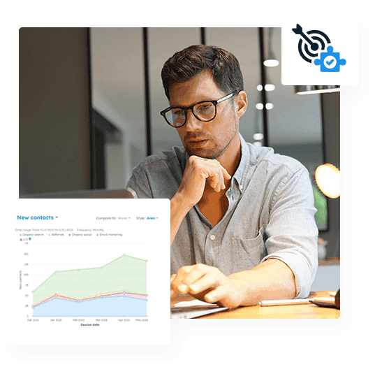 Team member reviewing a new-contacts growth chart, with a goals-tracking icon overlay