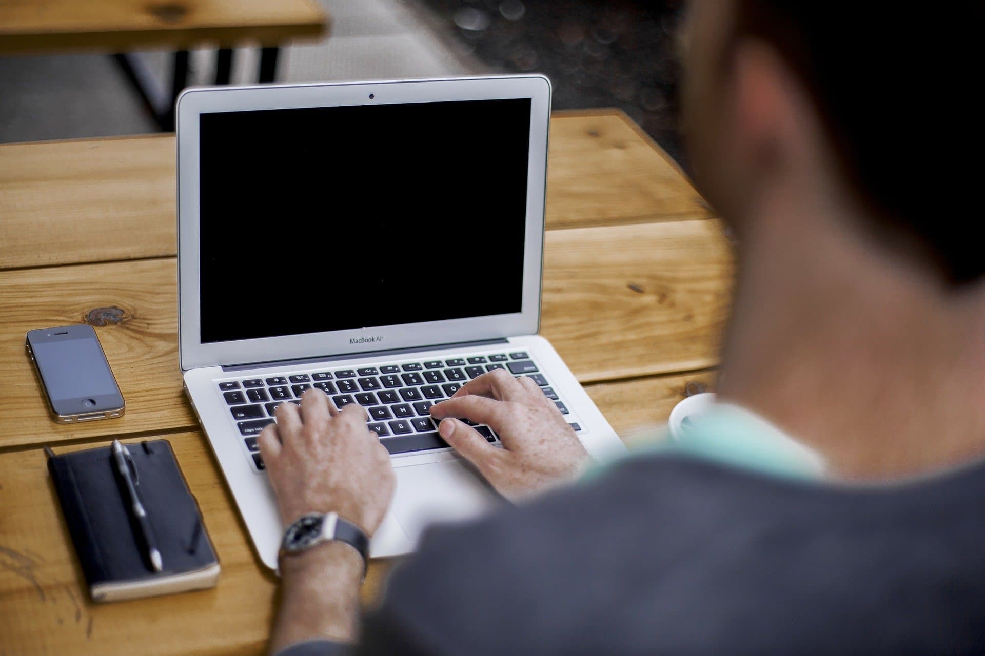 Stakeholder reviewing a RevOps business case on a laptop